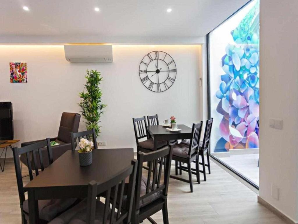 Faro Clara Suites Bagian luar foto