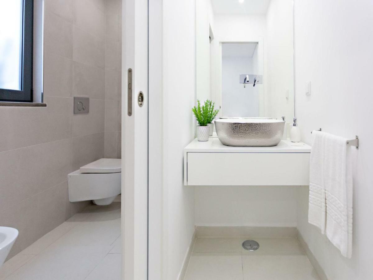 Faro Clara Suites Bagian luar foto
