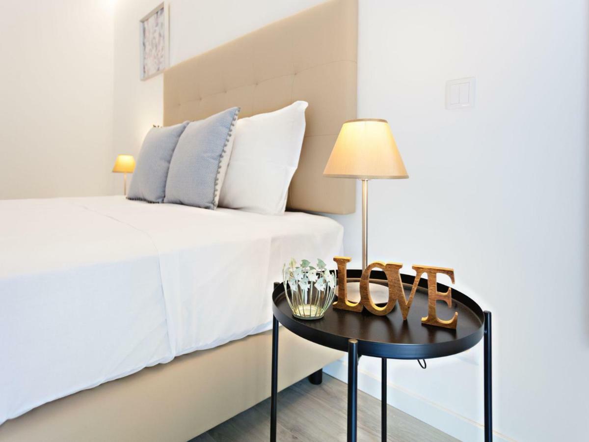 Faro Clara Suites Bagian luar foto