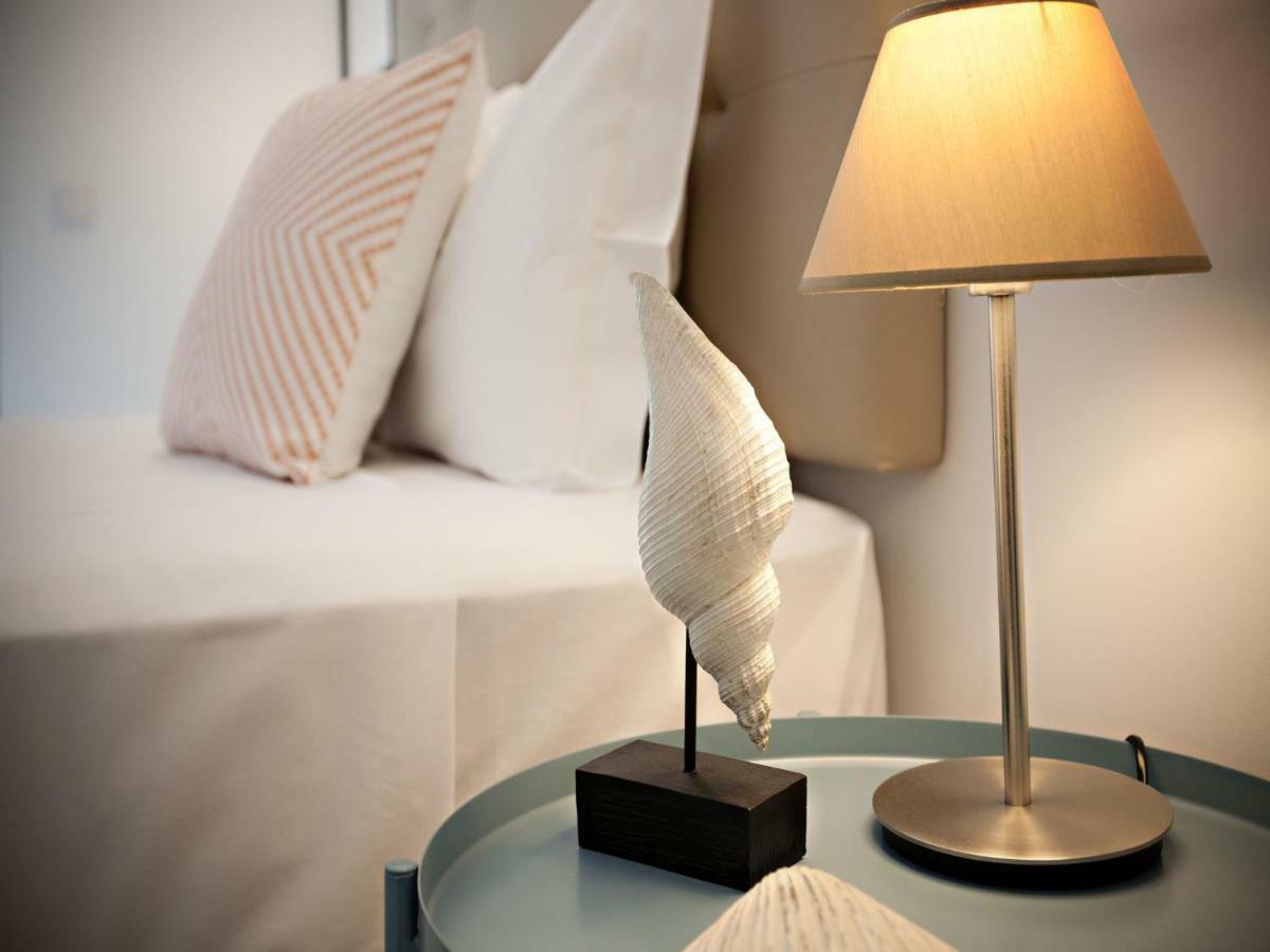 Faro Clara Suites Bagian luar foto