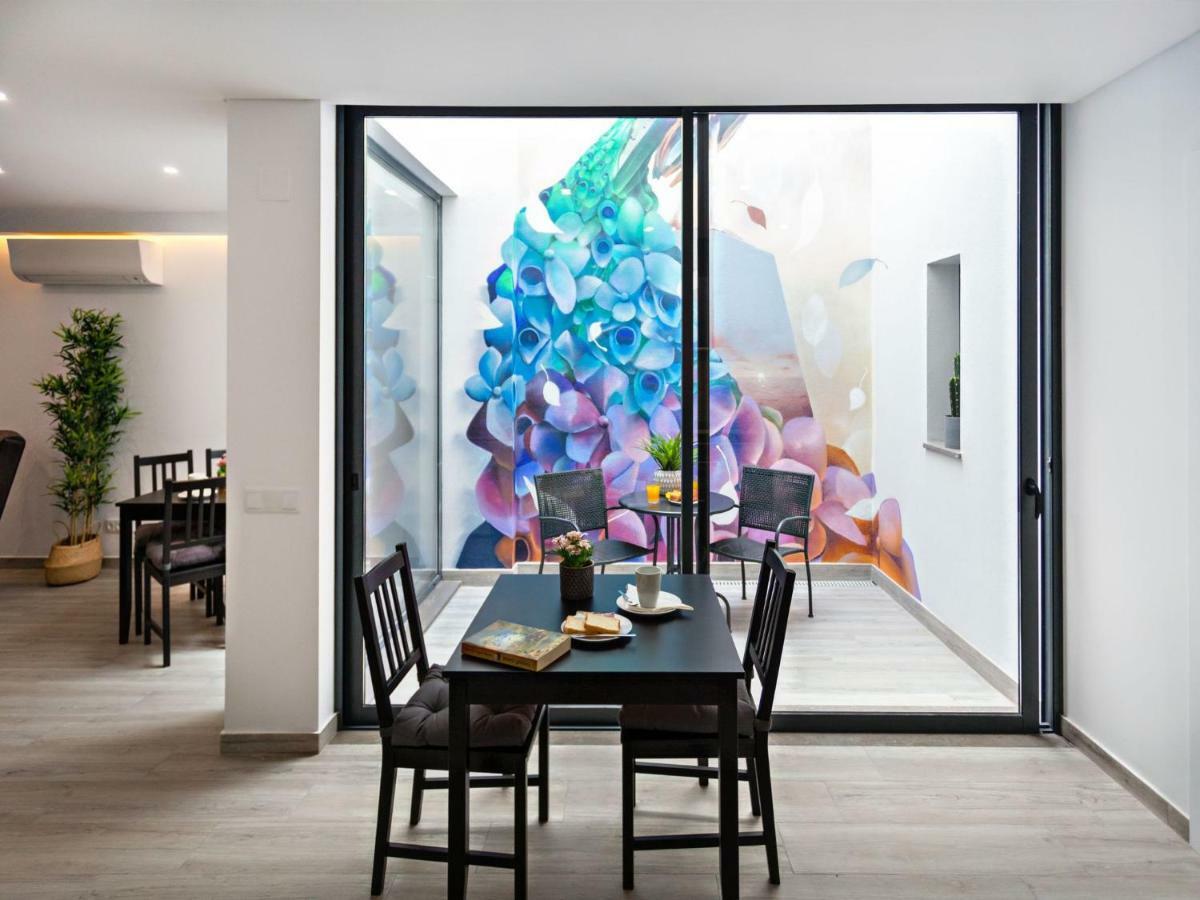 Faro Clara Suites Bagian luar foto