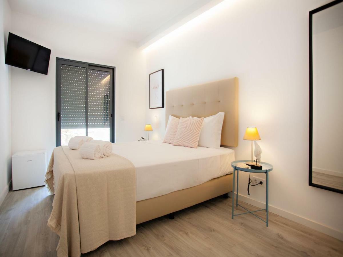 Faro Clara Suites Bagian luar foto