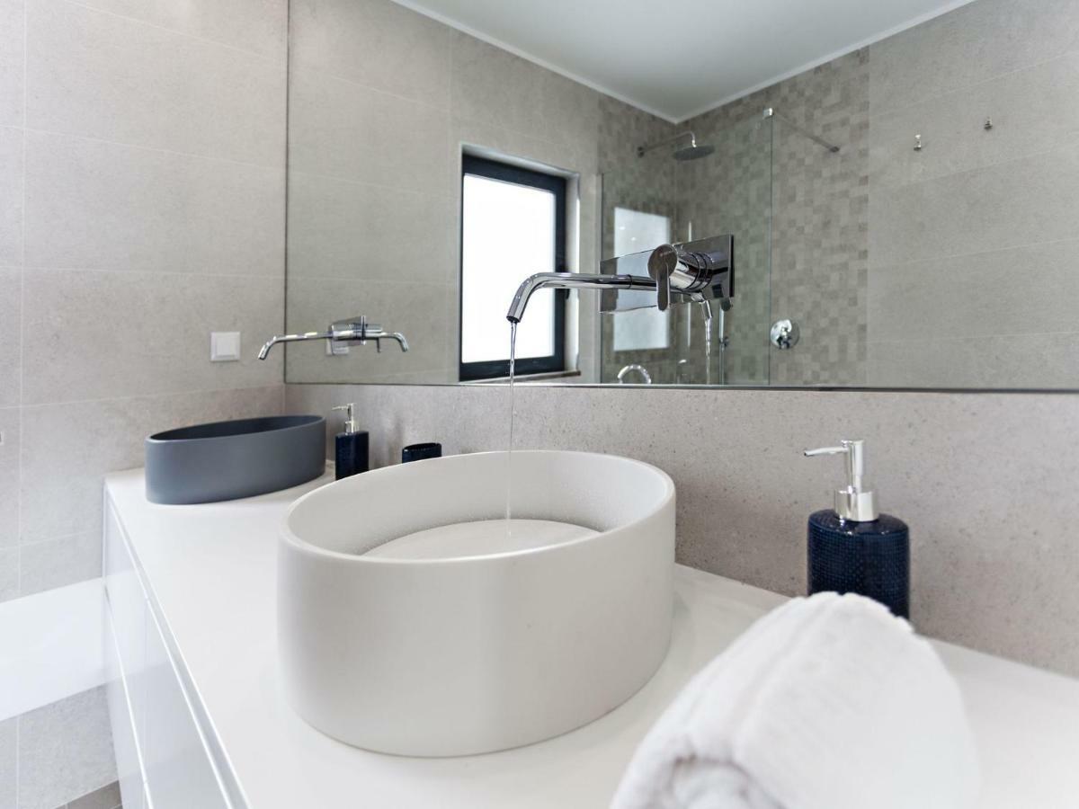 Faro Clara Suites Bagian luar foto