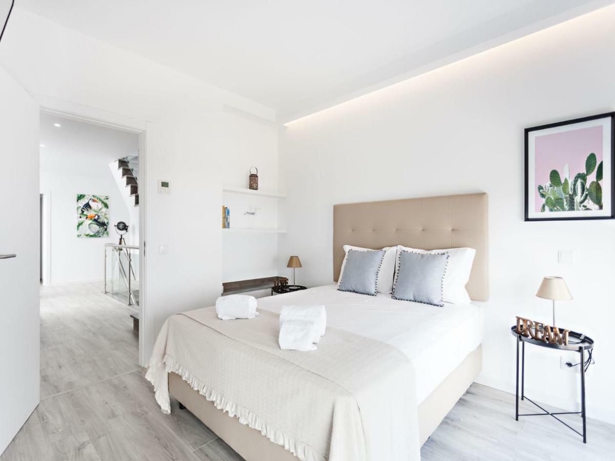 Faro Clara Suites Bagian luar foto